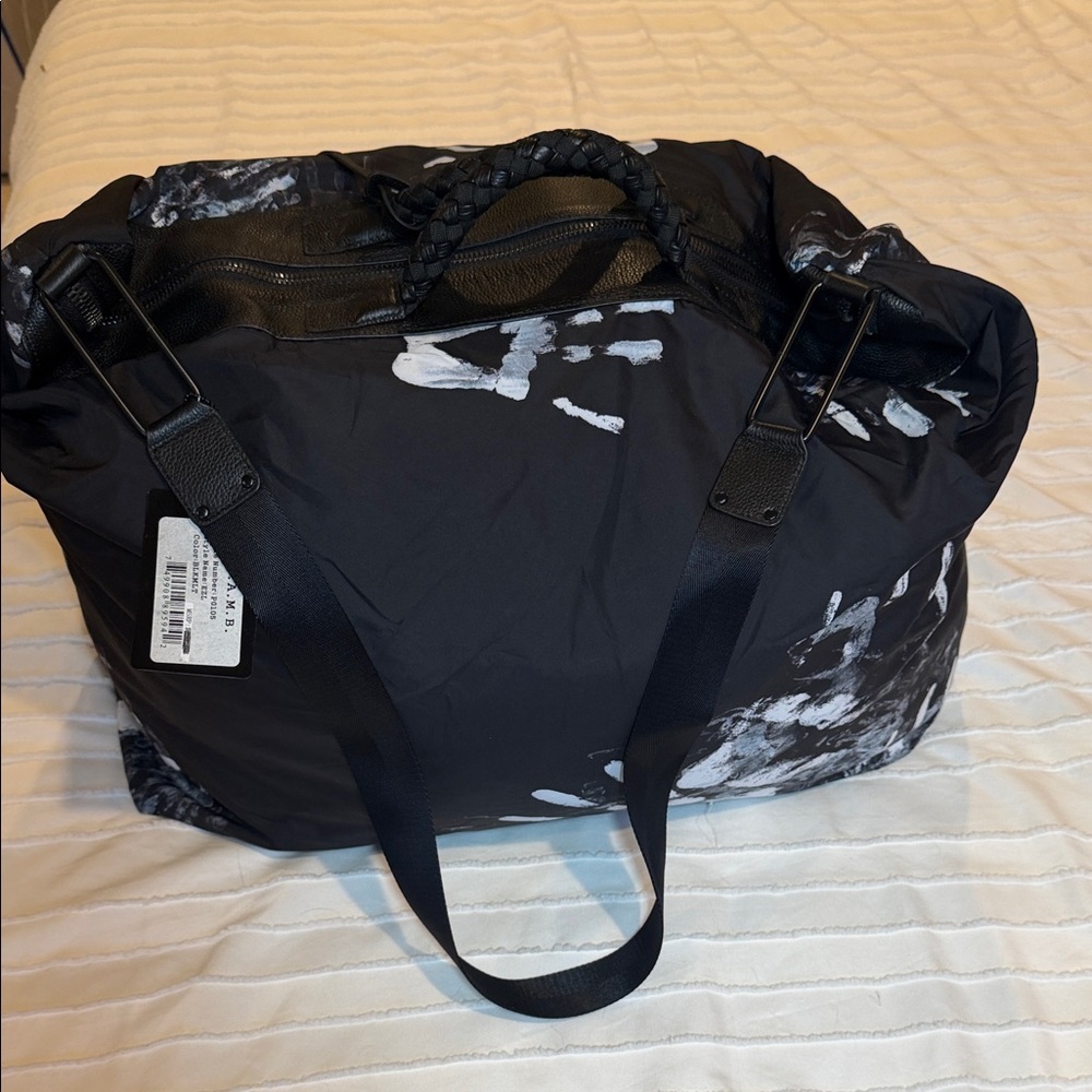 L.A.M.B. Black and White Duffel Bag - Picture 5 of 10